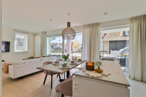 Fantastic new modern apartment with sunny garden, terrace and 2 parkings